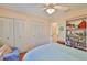 Cozy bedroom with a double door closet, and bright, natural light at 2417 Locksley St # 229, Sun City Center, FL 33573