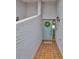Charming front door with tiled floor, wreath, and ample lighting at 2417 Locksley St # 229, Sun City Center, FL 33573