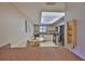 Kitchen featuring a skylight, a breakfast nook, and white cabinetry at 2417 Locksley St # 229, Sun City Center, FL 33573