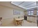 Cozy kitchen with a breakfast table, a garden window, and updated appliances at 2417 Locksley St # 229, Sun City Center, FL 33573