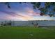 Beautiful waterfront backyard with lush lawn and private dock, perfect for relaxing by the water at 2650 W Bay Isle Se Dr, St Petersburg, FL 33705