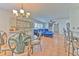 Bright open-concept living room and dining area with stylish furnishings and a decorative chandelier at 3110 Royal Tuscan Ln, Valrico, FL 33594