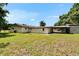 Exterior shot of the backyard and carport at 3212 Cork Rd, Plant City, FL 33565