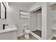 Bathroom with walk-in shower, modern vanity, and black accents at 3212 Cork Rd, Plant City, FL 33565