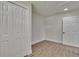 Bright bedroom features new floors, fresh paint, a closet and recessed lighting at 3212 Cork Rd, Plant City, FL 33565
