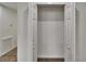 A view into a walk-in closet with double doors at 3212 Cork Rd, Plant City, FL 33565