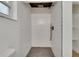Beautiful tiled shower features modern fixtures and a pebble floor at 3212 Cork Rd, Plant City, FL 33565