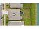 Aerial view of a private backyard with a well-maintained lawn, trampoline, and fenced perimeter at 33675 Elm Hill Br, Wesley Chapel, FL 33545