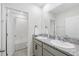 Modern bathroom with double sinks, granite countertops, and a shower/tub combination at 33675 Elm Hill Br, Wesley Chapel, FL 33545