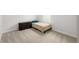 Cozy bedroom with a bed, dresser, and neutral carpeting at 33675 Elm Hill Br, Wesley Chapel, FL 33545