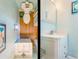 Stylish bathroom featuring modern fixtures, vanity with storage, and a clean, minimalist design at 3611 W Bay To Bay Blvd, Tampa, FL 33611