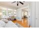 Comfortable bedroom featuring hardwood floors, versatile layout, and ample natural light for a relaxing space at 3611 W Bay To Bay Blvd, Tampa, FL 33611