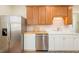 Bright kitchen featuring stainless steel appliances and white cabinetry at 3611 W Bay To Bay Blvd, Tampa, FL 33611