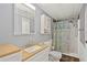 Bathroom featuring a vanity, toilet, and shower-tub combination at 36435 Bonney Dr, Zephyrhills, FL 33541