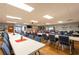 Large community meeting room featuring long tables and chairs for residents to gather at 36435 Bonney Dr, Zephyrhills, FL 33541