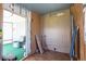 Unfurnished room with interior access to enclosed porch at 36435 Bonney Dr, Zephyrhills, FL 33541