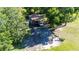 Arial view of metal structure, trailer, and truck parked at 37113 Waldo Dr, Dade City, FL 33525
