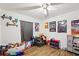 Spacious bedroom with lots of toys and wood laminate flooring at 37113 Waldo Dr, Dade City, FL 33525