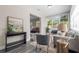 Comfortable seating area with large windows providing ample natural light and neighborhood views at 3907 W Walnut St, Tampa, FL 33607