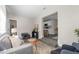 Comfortable living room with views into the adjacent kitchen area and ample seating at 3907 W Walnut St, Tampa, FL 33607