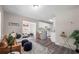 Open-concept living space seamlessly connects the living room and kitchen, enhancing the flow at 3907 W Walnut St, Tampa, FL 33607
