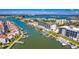 Beautiful aerial shot of waterfront condo community with docks and boat slips on a sunny day at 400 150Th Ave # 504, Madeira Beach, FL 33708