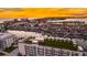 Picturesque aerial view showcasing the rooftop space and surrounding community at sunset at 400 150Th Ave # 504, Madeira Beach, FL 33708