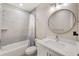 Full bathroom with shower and tub combination, neutral paint, and modern sink at 400 150Th Ave # 504, Madeira Beach, FL 33708