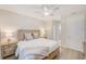 Bright bedroom featuring hardwood floors and neutral paint and decor at 400 150Th Ave # 504, Madeira Beach, FL 33708