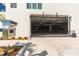 Secured garage entrance with keypad and black gate for residents only at 400 150Th Ave # 504, Madeira Beach, FL 33708