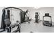 Modern gym with high-end equipment for a full-body workout in a private setting at 400 150Th Ave # 504, Madeira Beach, FL 33708