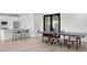 Community recreation room features ping pong and a snack bar with sleek countertops at 400 150Th Ave # 504, Madeira Beach, FL 33708