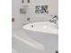 Bathroom with unique ceramic tiles, a modern sink, and sleek fixtures at 4317 S Hale Ave, Tampa, FL 33611