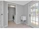 Functional laundry room with sink, washer, dryer, and access to the backyard at 4317 S Hale Ave, Tampa, FL 33611