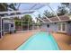 The screened-in pool provides plenty of space for relaxing and enjoying the outdoors at 4317 S Hale Ave, Tampa, FL 33611
