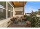 Relaxing outdoor balcony space perfect for seating with wood-like flooring at 4913 N Nebraska Ave # 5, Tampa, FL 33603