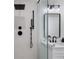 Stylish bathroom with a rainfall showerhead and modern fixtures, perfect for relaxation at 4913 N Nebraska Ave # 5, Tampa, FL 33603