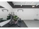 Home gym with a spin bike, mirror, and pull-up bar at 4913 N Nebraska Ave # 5, Tampa, FL 33603