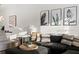Stylish living area with comfortable seating, layered textures, and decorative art at 4913 N Nebraska Ave # 5, Tampa, FL 33603