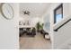 Bright living room features modern ceiling fan, decor, and comfortable seating at 4913 N Nebraska Ave # 5, Tampa, FL 33603