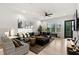 Inviting living room with a comfortable sectional, natural light, and modern decor at 4913 N Nebraska Ave # 5, Tampa, FL 33603