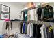Well-organized walk-in closet featuring clothing racks, shelves, and decor at 4913 N Nebraska Ave # 5, Tampa, FL 33603