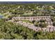Community aerial view showcasing the neighborhood, golf course and mature trees at 5224 Fairway One Dr, Valrico, FL 33596