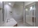 Bright bathroom featuring glass shower, stylish vanity, and modern fixtures at 5224 Fairway One Dr, Valrico, FL 33596