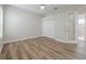 This is a bright and airy bedroom complete with a closet and a ceiling fan and neutral paint at 5224 Fairway One Dr, Valrico, FL 33596