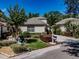 Charming home with a well-manicured lawn, a two-car garage, and a neutral colored stucco exterior at 5224 Fairway One Dr, Valrico, FL 33596
