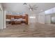 A spacious living area with kitchen, dining, and living area in an open floor plan at 5224 Fairway One Dr, Valrico, FL 33596