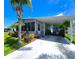 Attractive home with carport and lush landscaping at 5258 Wisteria Cir, New Port Richey, FL 34653