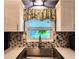 The kitchen features a window over the sink that pours natural light into the updated space at 5258 Wisteria Cir, New Port Richey, FL 34653