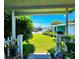 Charming patio view of a manicured lawn and well-maintained neighborhood at 5258 Wisteria Cir, New Port Richey, FL 34653